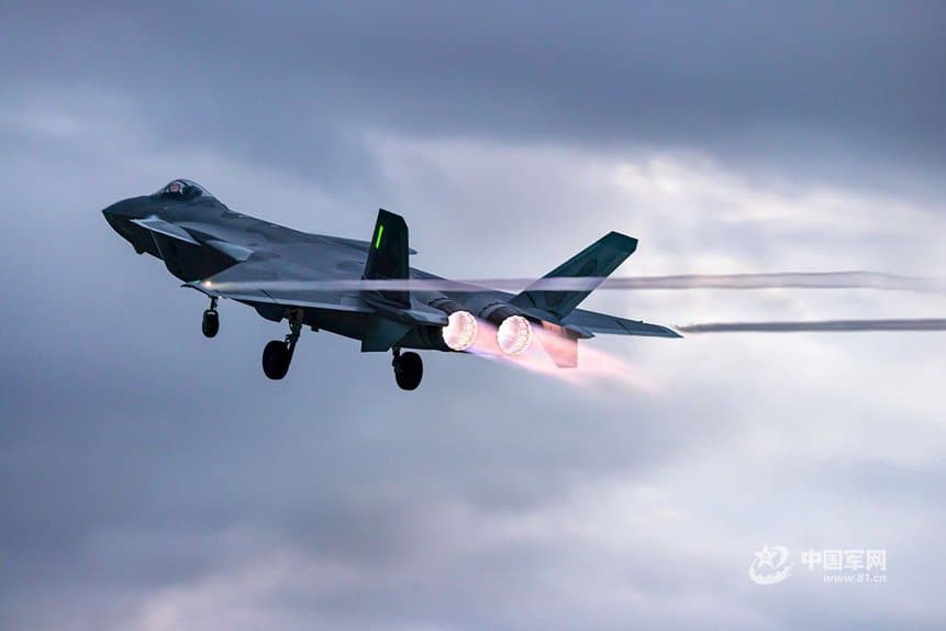 China's J-20 stealth fighter takes off with engines on full afterburner.