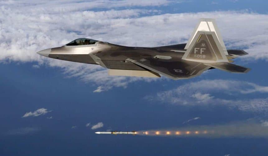 F-22 firing an AIM-120 AMRAAM air-to-air missile. Photo: USAF.