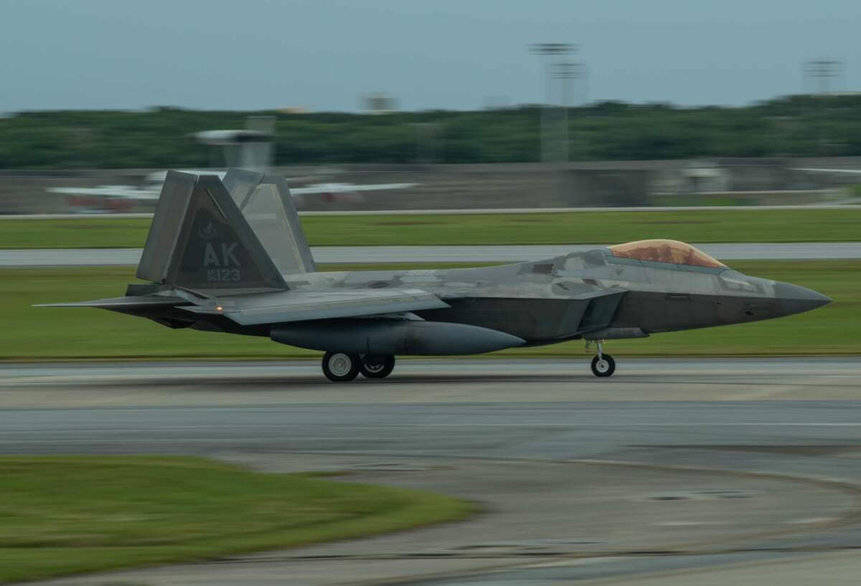 US Air Force F-22 Raptor stealth fighter landing at Kadena Air Base, Japan