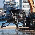 Acidente entre helicópteros Airbus EC130 deixou quatro mortos e nove feridos, três em estado crítico. Aeronaves eram operadas pela Sea World Helicopters. Foto: Scott Powick - news.com.au