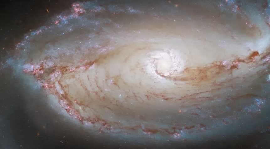 Coração da galáxia espiral barrada NGC 1097, como visto pelo Telescópio Espacial Hubble da NASA. Imagem: ESA/Hubble & NASA, D. Areia, K. Sheth